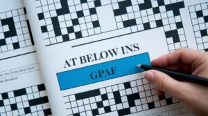 Graf Below a Headline Crossword Clue